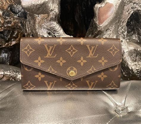 louis vuitton epi sarah wallet review|louis vuitton brown monogram wallet.